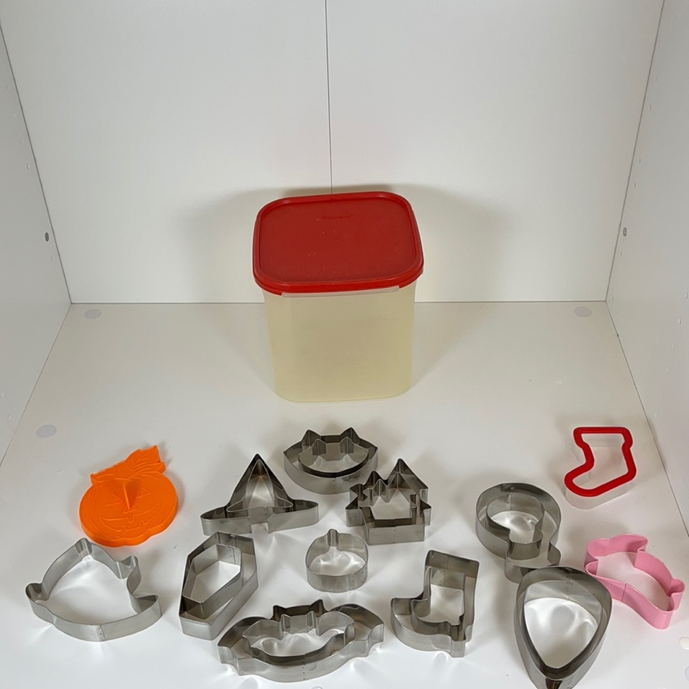 21 Cookie Cutters with a Tupperware 17 cup Storage Box